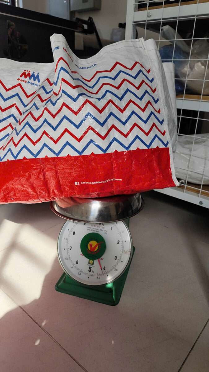 Weighing Laundry to Calculate Accurate Cleaning Costs at DrClean247 laundry and shoe cleaning prices